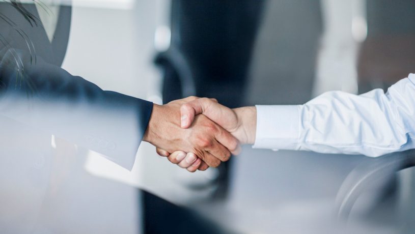 two people shaking hands